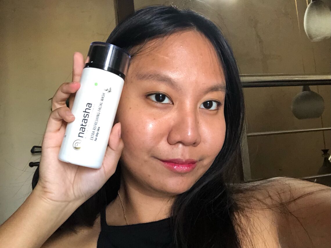 Woman with a Natasha Skin Care product